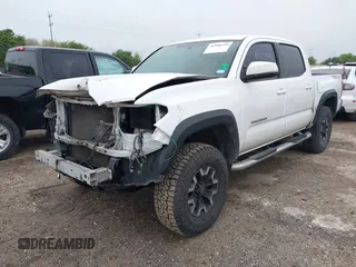 2016 Toyota Tacoma SR with VIN 5TFCZ5AN6GX006039, listed as a IAAI auction lot 41908239 with 222,939 mi miles and . Bid and sale history available at DreamBid. Image 18.
