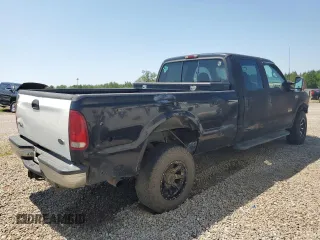 2000 Ford F-350 XL with VIN 1FTSW31F3YEB20854, listed as a Copart auction lot 61717865 with 209,288 mi miles and Salvage title. Bid and sale history available at DreamBid. Image 3.
