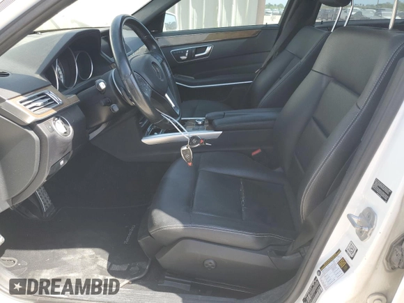 2016 Mercedes-Benz E 350 Luxury with VIN WDDHF8JB0GB189737, listed as a Copart auction lot 52492805 with 161,916 mi miles and Salvage Title. Bid and sale history available at DreamBid. Image 7.