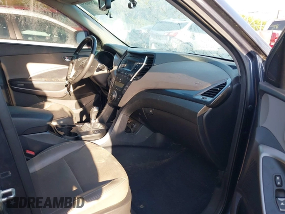 2016 Hyundai Santa Fe z VIN 5XYZUDLB3GG312687, wystawiony jako IAAI lot #42096854 z przebiegiem 162 586 mil mil oraz . Historia ofert i sprzedaży dostępna na DreamBid. Obrazek 5.