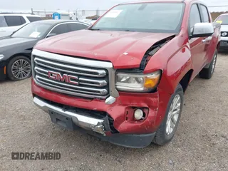 2015 GMC Canyon 2WD SLT with VIN 1GTG5CE3XF1211164, listed as a IAAI auction lot 41490387 with 163,932 mi miles. Bid and sale history available at carsss.com. Image 6.