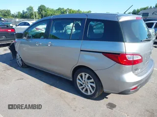 2012 Mazda 5 Sport with VIN JM1CW2BLXC0129303, listed as a IAAI auction lot 42556899 with 200,863 mi miles and . Bid and sale history available at DreamBid. Image 3.
