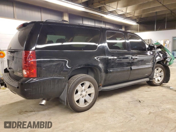 2007 GMC Yukon XL SLT z VIN 1GKFK16377J349144, wystawiony jako Copart lot #84300374 z przebiegiem Nie podano mil oraz Szkoda całkowita • Salvage title. Historia ofert i sprzedaży dostępna na DreamBid. Obrazek 3.