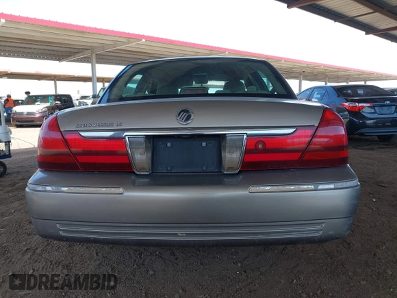 2003 Mercury Grand Marquis LS Premium with VIN 2MEFM75W23X613004, listed as a IAAI auction lot 41974625 with 151,023 mi miles and . Bid and sale history available at DreamBid. Image 16.