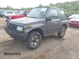 1997 Chevrolet Tracker z VIN 2CNBJ1863V6906951, wystawiony jako IAAI lot #42400087 z przebiegiem 209 563 mil mil oraz . Historia ofert i sprzedaży dostępna na DreamBid. Obrazek 2.