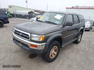 1998 Toyota 4Runner Limited with VIN JT3HN87R2W0150437, listed as a IAAI auction lot 41714141 with 264,389 mi miles. Bid and sale history available at carsss.com. Image 2.