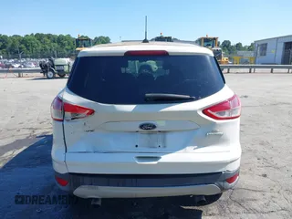 2013 Ford Escape SE with VIN 1FMCU0GX2DUB85361, listed as a IAAI auction lot 42552881 with 211,032 mi miles and . Bid and sale history available at DreamBid. Image 16.