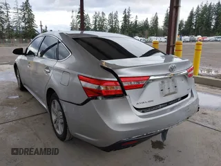 2014 Toyota Avalon Limited with VIN 4T1BK1EB3EU104576, listed as a IAAI auction lot 41773431 with 105,419 mi miles. Bid and sale history available at carsss.com. Image 3.