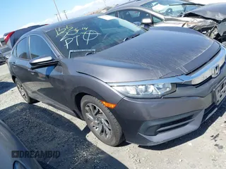 2016 Honda Civic EX with VIN 2HGFC2F74GH550780, listed as a IAAI auction lot 42135678 with 125,005 mi miles and . Bid and sale history available at DreamBid. Image 1.