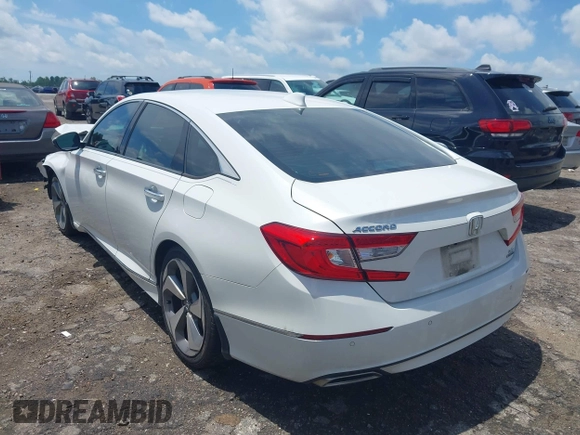 2019 Honda Accord Touring with VIN 1HGCV2F96KA015987, listed as a IAAI auction lot 42528744 with 174,735 mi miles and . Bid and sale history available at DreamBid. Image 3.