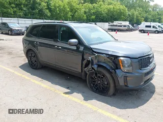 2022 Kia Telluride SX z VIN 5XYP5DHCXNG273602, wystawiony jako IAAI lot #42492363 z przebiegiem 74 883 mil mil oraz . Historia ofert i sprzedaży dostępna na DreamBid. Obrazek 1.