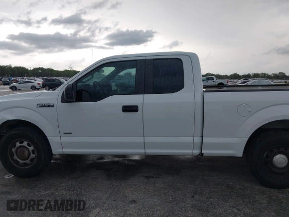 2015 Ford F-150 XL with VIN 1FTEX1CP7FFB56879, listed as a IAAI auction lot 42414408 with 212,042 mi miles and . Bid and sale history available at DreamBid. Image 14.