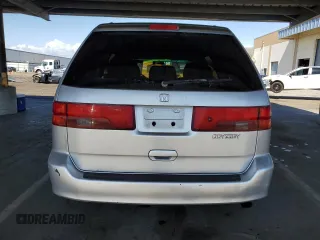 2001 Honda Odyssey EX z VIN 2HKRL18601H559033, wystawiony jako Copart lot #57119025 z przebiegiem 333 068 mil mil oraz Szkoda całkowita • Salvage title. Historia ofert i sprzedaży dostępna na DreamBid. Obrazek 6.