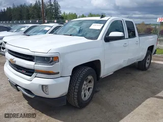 2017 Chevrolet Silverado 1500 LT with VIN 1GCVKREC7HZ131196, listed as a IAAI auction lot 42072336 with 158,140 mi miles. Bid and sale history available at carsss.com. Image 2.