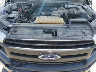 2018 Ford F-150 XL z VIN 1FTEX1CB0JKF29765, wystawiony jako Copart lot #63671145 z przebiegiem 106 036 mil mil oraz Czysty tytuł • Clean title. Historia ofert i sprzedaży dostępna na DreamBid. Obrazek 11.