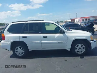 2003 GMC Envoy SLT z VIN 1GKDS13S532221928, wystawiony jako IAAI lot #42211340 z przebiegiem 149 902 mil mil oraz . Historia ofert i sprzedaży dostępna na DreamBid. Obrazek 13.