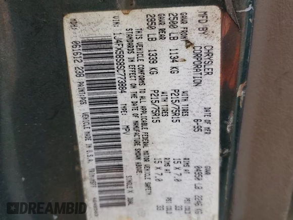 1995 Jeep Grand Cherokee Laredo with VIN 1J4FX58S8SC773884, listed as a Copart auction lot 56572555 with 424,126 mi miles and Salvage title. Bid and sale history available at DreamBid. Image 12.