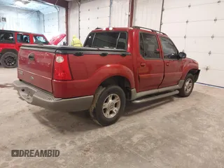 2003 Ford Explorer Sport Trac XLS z VIN 1FMZU67EX3UC27706, wystawiony jako IAAI lot #42214344 z przebiegiem 181 537 mil mil oraz . Historia ofert i sprzedaży dostępna na DreamBid. Obrazek 4.