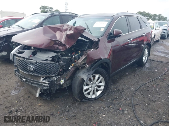 2016 Kia Sorento LX with VIN 5XYPG4A55GG142487, listed as a IAAI auction lot 41792925 with 118,355 mi miles. Bid and sale history available at carsss.com. Image 2.