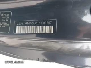 2007 Hyundai Accent GS with VIN KMHCM36C07U003757, listed as a IAAI auction lot 41925544 with 89,882 mi miles. Bid and sale history available at carsss.com. Image 9.