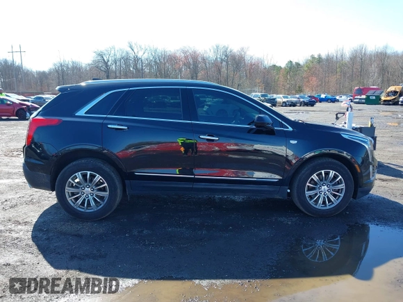 2019 Cadillac XT5 Luxury AWD with VIN 1GYKNDRS0KZ219247, listed as a IAAI auction lot 41870568 with 58,734 mi miles and . Bid and sale history available at carsss.com. Image 13.