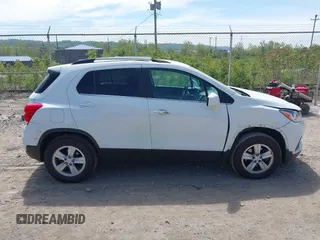 2020 Chevrolet Trax LT with VIN KL7CJPSB5LB002799, listed as a IAAI auction lot 42247119 with 92,459 mi miles and . Bid and sale history available at DreamBid. Image 13.