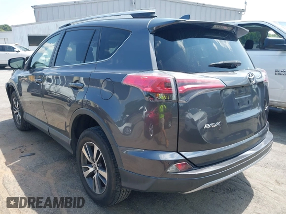 2018 Toyota RAV4 XLE with VIN JTMWFREV9JJ201845, listed as a IAAI auction lot 42442303 with 111,177 mi miles and . Bid and sale history available at DreamBid. Image 3.