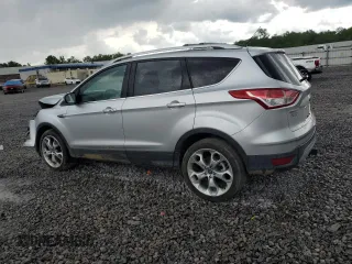 2013 Ford Escape Titanium with VIN 1FMCU9J94DUB00695, listed as a Copart auction lot 56633955 with 129,011 mi miles and Salvage title. Bid and sale history available at DreamBid. Image 2.
