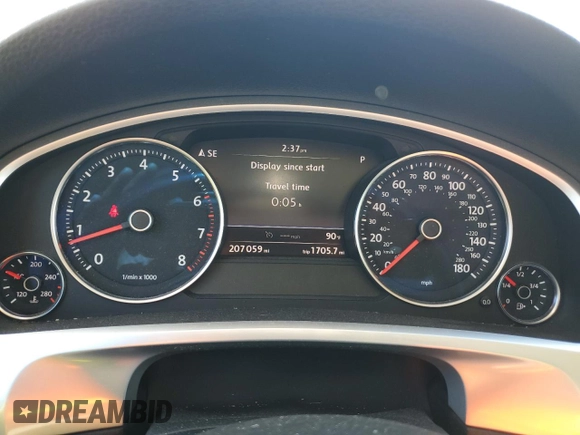 2014 Volkswagen Touareg Lux z VIN WVGEF9BP4ED011436, wystawiony jako Copart lot #74207144 z przebiegiem 207 059 mil mil oraz Szkoda całkowita • Salvage title. Historia ofert i sprzedaży dostępna na DreamBid. Obrazek 9.