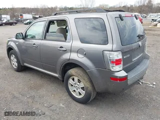 2009 Mercury Mariner with VIN 4M2CU91G49KJ05721, listed as a IAAI auction lot 41919006 with 105,537 mi miles. Bid and sale history available at carsss.com. Image 3.