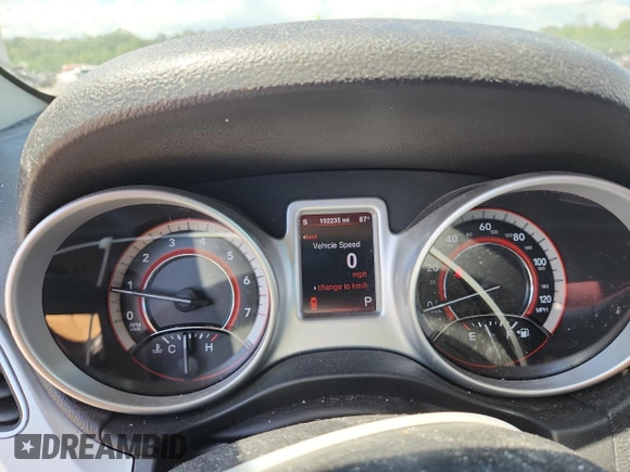 2013 Dodge Journey Crew with VIN 3C4PDCDG5DT599840, listed as a Copart auction lot 62542795 with 102,235 mi miles and Salvage title. Bid and sale history available at DreamBid. Image 9.