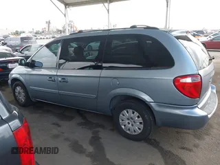2006 Chrysler Town & Country LX with VIN 1A4GP44R46B609965, listed as a IAAI auction lot 42093438 with 333,689 mi miles and . Bid and sale history available at DreamBid. Image 14.