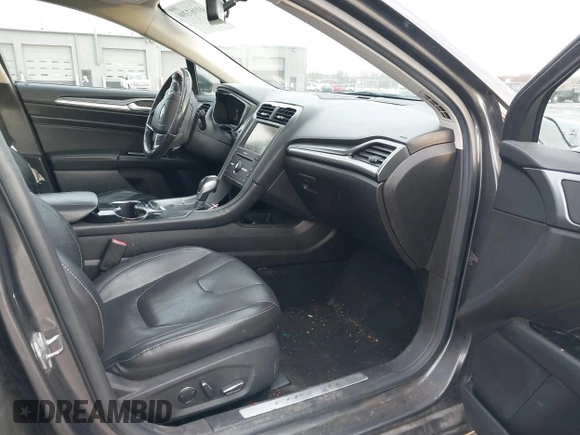 2016 Ford Fusion Titanium with VIN 3FA6P0K93GR316770, listed as a IAAI auction lot 41067390 with 139,818 mi miles. Bid and sale history available at carsss.com. Image 5.