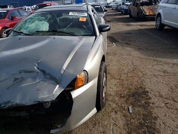 2005 Dodge Stratus SXT z VIN 4B3AG42G25E038535, wystawiony jako Copart lot #75240094 z przebiegiem Nie podano mil oraz Szkoda całkowita • Salvage title. Historia ofert i sprzedaży dostępna na DreamBid. Obrazek 11.