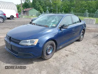 2013 Volkswagen Jetta SE z VIN 3VWDP7AJ0DM292598, wystawiony jako IAAI lot #42360798 z przebiegiem 169 885 mil mil oraz . Historia ofert i sprzedaży dostępna na DreamBid. Obrazek 2.