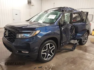 2022 Honda Passport Elite z VIN 5FNYF8H05NB013145, wystawiony jako IAAI lot #41355097 z przebiegiem 45 615 mil mil oraz . Historia ofert i sprzedaży dostępna na DreamBid. Obrazek 2.