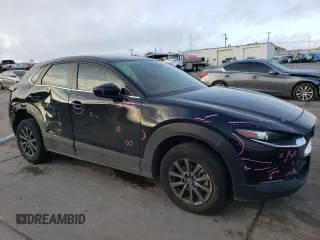 2022 Mazda CX-30 S with VIN 3MVDMBAL5NM405431, listed as a Copart auction lot 85294924 with 29,760 mi miles and Salvage title. Bid and sale history available at DreamBid. Image 4.
