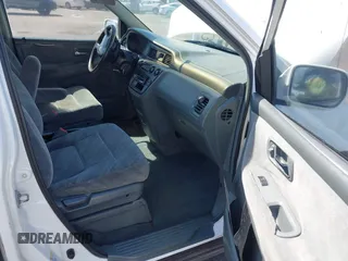 2002 Honda Odyssey EX z VIN 2HKRL18632H556791, wystawiony jako IAAI lot #41562553 z przebiegiem 222 976 mil mil oraz . Historia ofert i sprzedaży dostępna na DreamBid. Obrazek 5.
