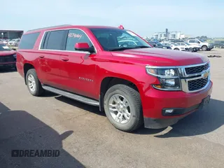 2015 Chevrolet Suburban LT with VIN 1GNSKJKC5FR726299, listed as a IAAI auction lot 42740904 with 96,700 mi miles and . Bid and sale history available at DreamBid. Image 1.