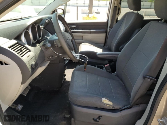 2008 Dodge Grand Caravan SE z VIN 2D8HN44H58R146828, wystawiony jako Copart lot #57417075 z przebiegiem 186 657 mil mil oraz Nie do naprawy • Non repairable. Historia ofert i sprzedaży dostępna na DreamBid. Obrazek 7.