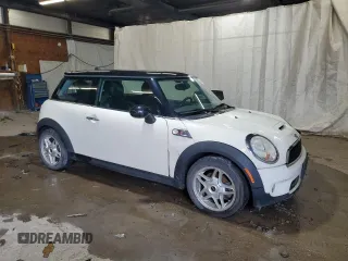 2009 MINI Hardtop S with VIN WMWMF73509TW83066, listed as a Copart auction lot 58603205 with 113,242 mi miles and Salvage title. Bid and sale history available at DreamBid. Image 4.