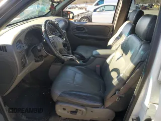 2003 Chevrolet TrailBlazer LTZ with VIN 1GNDT13S832260691, listed as a Copart auction lot 85911284 with 140,993 mi miles and Salvage Title. Bid and sale history available at DreamBid. Image 7.