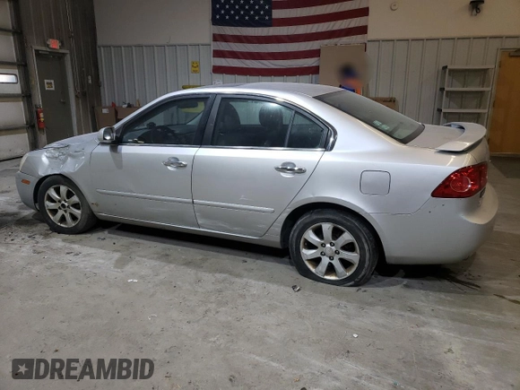 2007 Kia Optima EX with VIN KNAGE124675137864, listed as a Copart auction lot 87433434 with 141,682 mi miles and Salvage Title. Bid and sale history available at carsss.com. Image 2.
