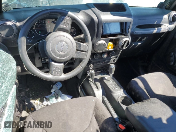 2014 Jeep Wrangler Unlimited Sport with VIN 1C4BJWDG7EL257811, listed as a Copart auction lot 50112335 with 218,530 mi miles and Salvage Title. Bid and sale history available at carsss.com. Image 8.