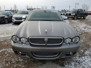 2009 Jaguar XJ with VIN SAJXA82B69SH31532, listed as a Copart auction lot 88027035 with 90,233 mi miles and Clean Title. Bid and sale history available at DreamBid. Image 5.