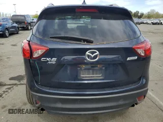 2016 Mazda CX-5 Grand Touring with VIN JM3KE4DY4G0750939, listed as a Copart auction lot 52727395 with 72,428 mi miles and Salvage Title. Bid and sale history available at carsss.com. Image 6.