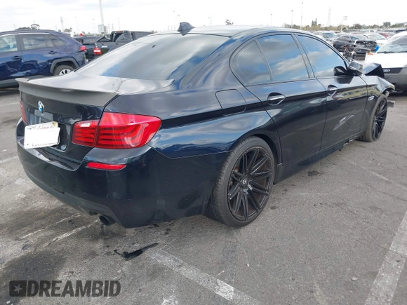 2014 BMW 5 Series 535i with VIN WBA5B1C51ED476896, listed as a IAAI auction lot 41442341 with 177,104 mi miles and . Bid and sale history available at DreamBid. Image 4.