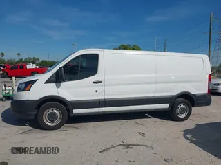 2019 Ford Transit z VIN 1FTYR2ZM1KKB25574, wystawiony jako IAAI lot #41891247 z przebiegiem 142 627 mil mil oraz . Historia ofert i sprzedaży dostępna na DreamBid. Obrazek 14.