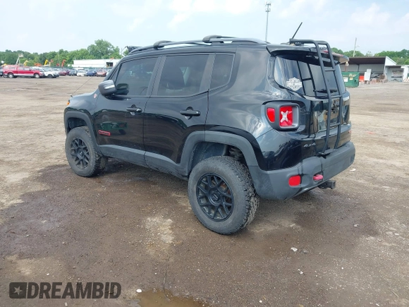 2015 Jeep Renegade Trailhawk z VIN ZACCJBCT9FPB36609, wystawiony jako IAAI lot #42593933 z przebiegiem 106 074 mil mil oraz . Historia ofert i sprzedaży dostępna na DreamBid. Obrazek 3.