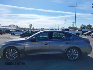 2021 Infiniti Q50 Luxe z VIN JN1EV7BP3MM701871, wystawiony jako IAAI lot #41383333 z przebiegiem 28 634 mil mil oraz . Historia ofert i sprzedaży dostępna na DreamBid. Obrazek 6.